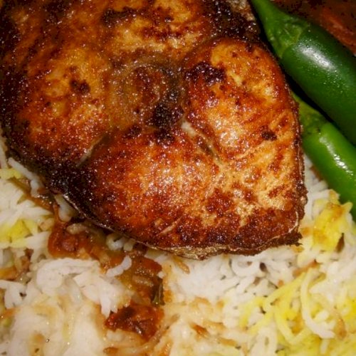 سمك كنعد مقلي مع الرز